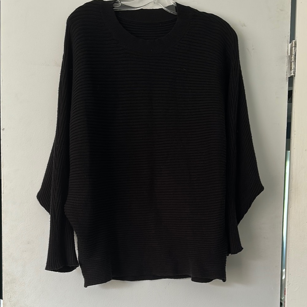 Black woman’s Sweater